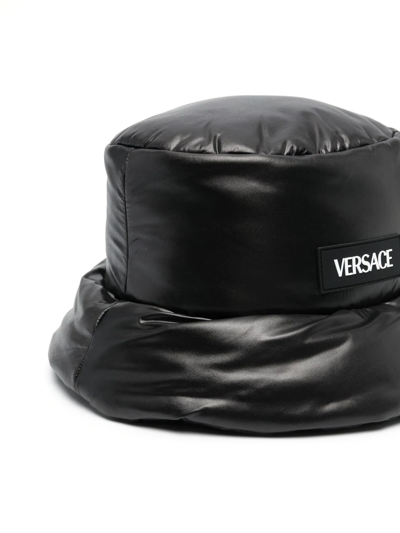 Shop Versace Logo-patch Padded Bucket Hat In Schwarz
