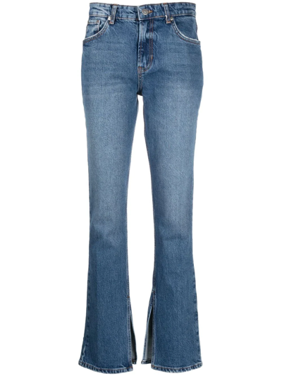 Shop Liu •jo Side-slit Bootcut Jeans In Blue