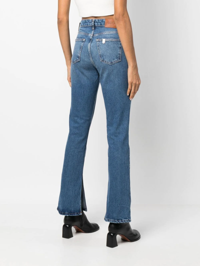 Shop Liu •jo Side-slit Bootcut Jeans In Blue