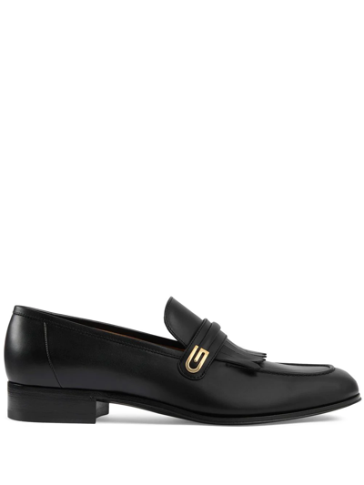 Shop Gucci Mirrored G Fringed Loafers In Schwarz