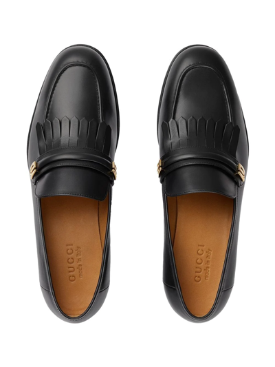 Shop Gucci Mirrored G Fringed Loafers In Schwarz