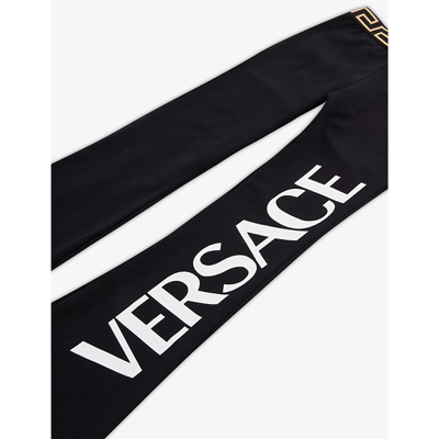 Shop Versace Logo-print Stretch-cotton Jersey Trousers 4-14 Years In Nero+bianco