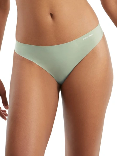 Shop Calvin Klein Invisibles Thong In Sage Meadow