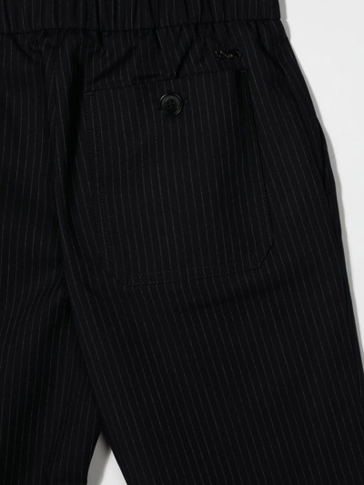 Shop Emporio Armani Pinstripe Trousers In Fantasia Blu