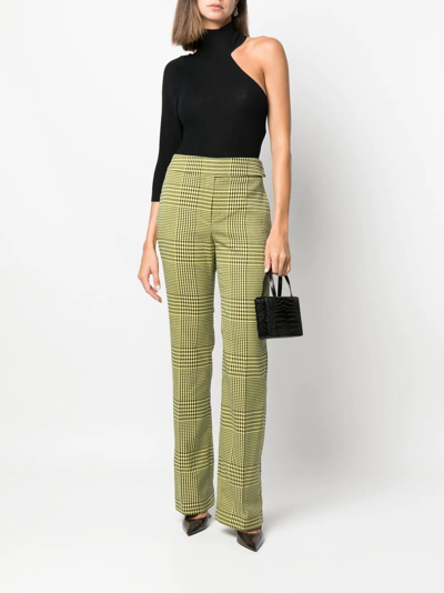 Shop Alexandre Vauthier Houndstooth-print Flared Trousers In Grün