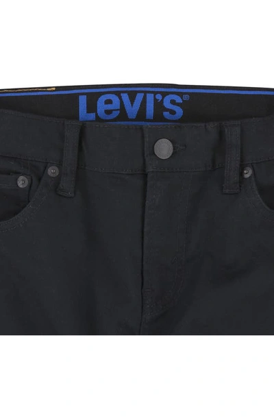 Shop Levi's 502™ Strong Performance Straight Leg Jeans In Black
