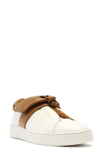 Shop Alexandre Birman Clarita Bow Slip-on Sneaker In White/ Cognac