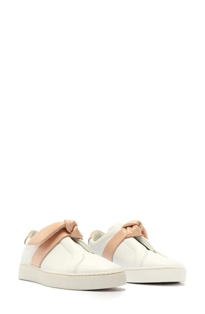 Shop Alexandre Birman Clarita Bow Slip-on Sneaker In White/ Nude