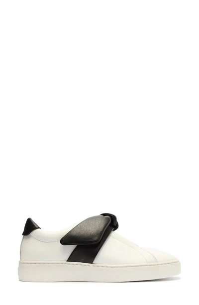 Shop Alexandre Birman Clarita Bow Slip-on Sneaker In White/ Black