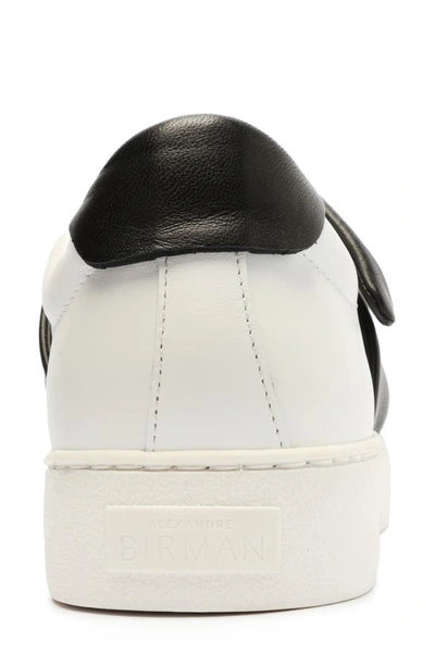 Shop Alexandre Birman Clarita Bow Slip-on Sneaker In White/ Black