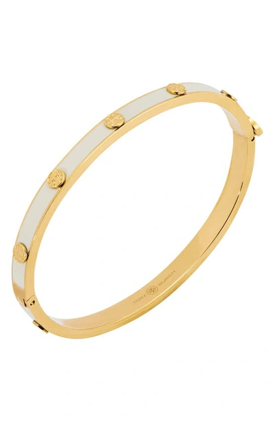 Shop Tory Burch Miller Stud Hinge Bracelet In Tory Gold / New Ivory