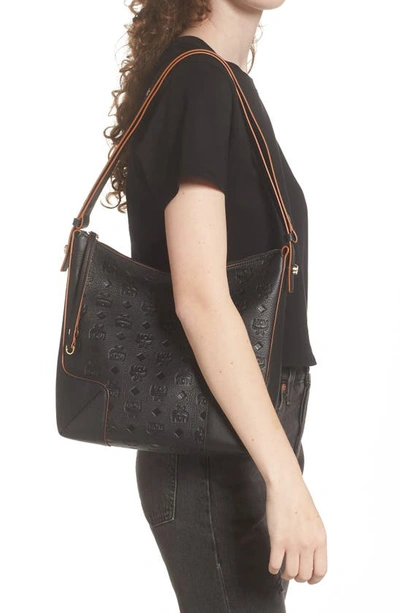 Shop Mcm Medium Klara Leather Hobo Bag In Black