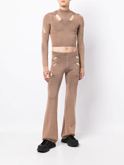 Shop Dion Lee Flared Cut-out Detail Trousers In Braun