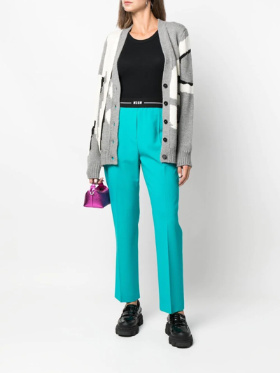 Shop Msgm Logo-waist Slim Tailored Trousers In Blau