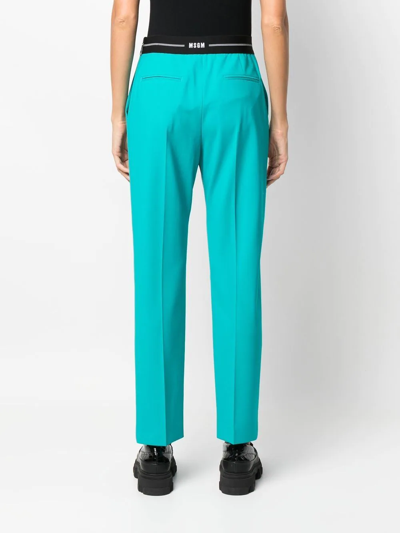 Shop Msgm Logo-waist Slim Tailored Trousers In Blau