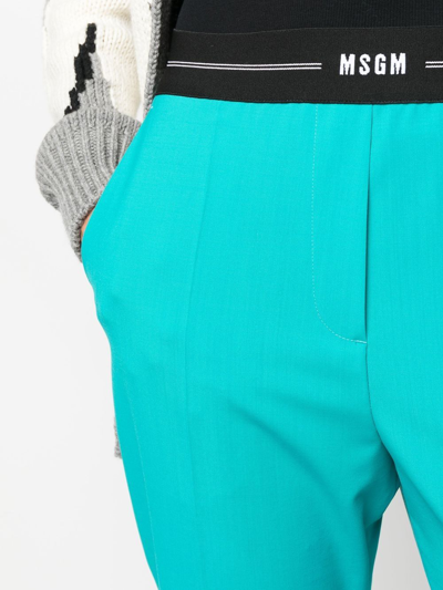 Shop Msgm Logo-waist Slim Tailored Trousers In Blau