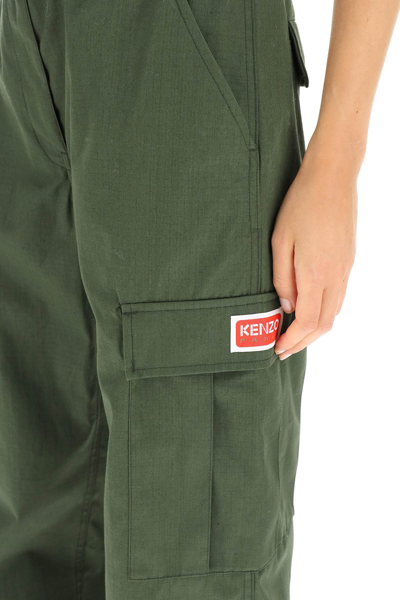 Shop Kenzo Cargo Pants With Flower-shaped Button In Khaki,green