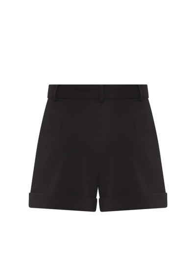 Shop Moschino Shorts In Black