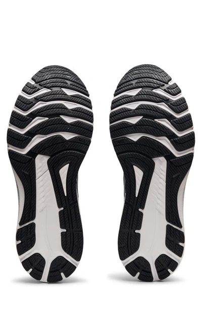 Shop Asics Gt-1000 10 Running Shoe In Black/ White