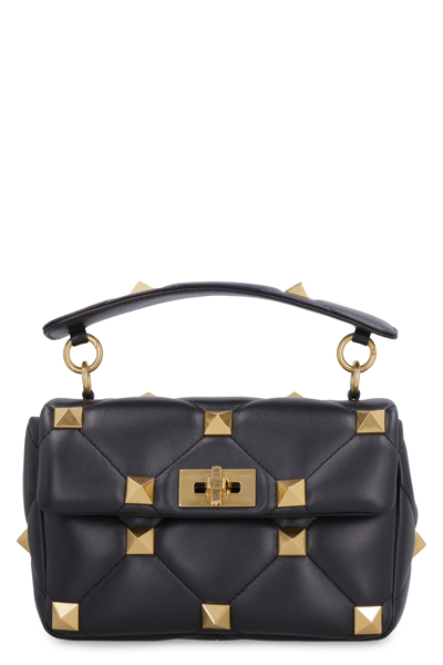 Shop Valentino Garavani - Roman Stud Quilted Leather Bag In Black