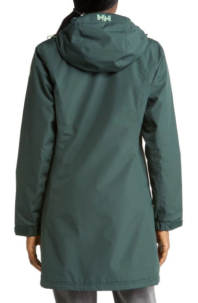 Shop Helly Hansen 'belfast' Long Waterproof Winter Rain Jacket In Darkest Spruce