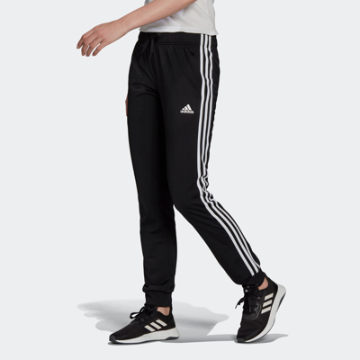 Shop Adidas Originals Women's Adidas Primegreen Essentials Warm-up Slim Tapered 3-stripes Track Pants In Black