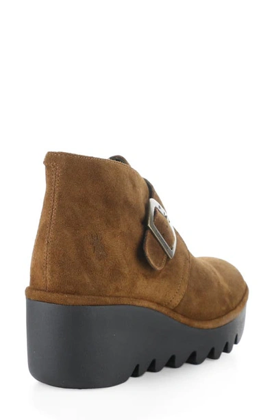 Shop Fly London Brit Wedge Bootie In Camel Oil Suede