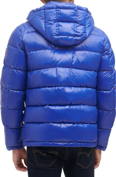 Shop Guess Hooded Solid Puffer Jacket In Navy