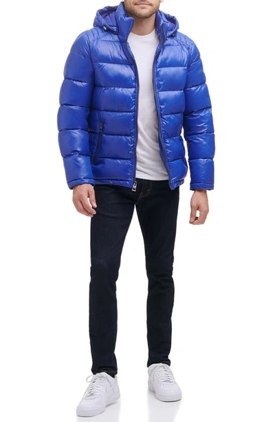 Shop Guess Hooded Solid Puffer Jacket In Navy