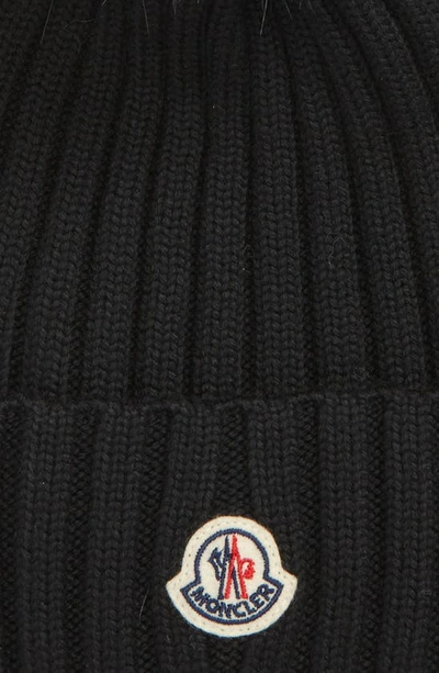 Shop Moncler Wool Rib Beanie With Faux Fur Pompom In Black