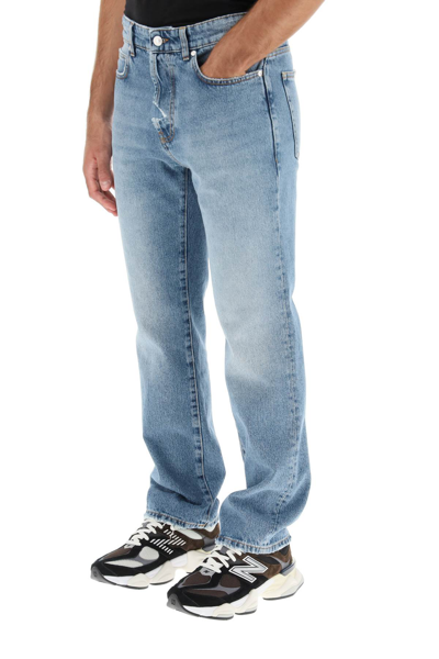 Shop Msgm Distressed Jeans With Micro Logo In Blue