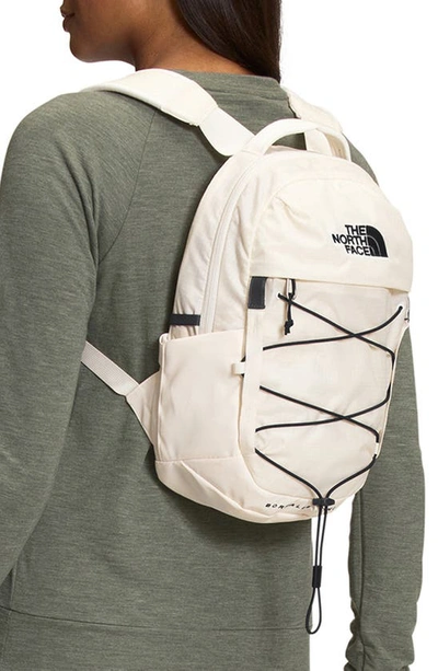 Shop The North Face Borealis Water Repellent Mini Backpack In Gardenia White/ Tnf Black
