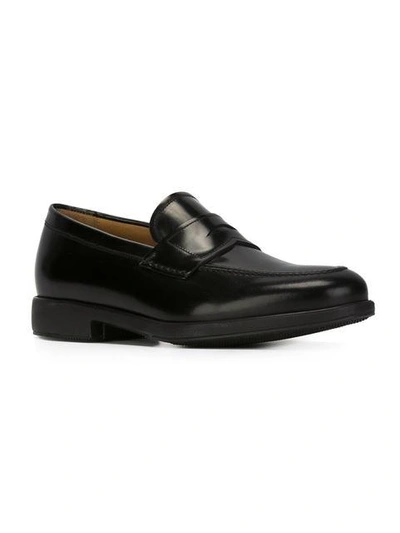 Shop Ferragamo Classic Penny Loafers