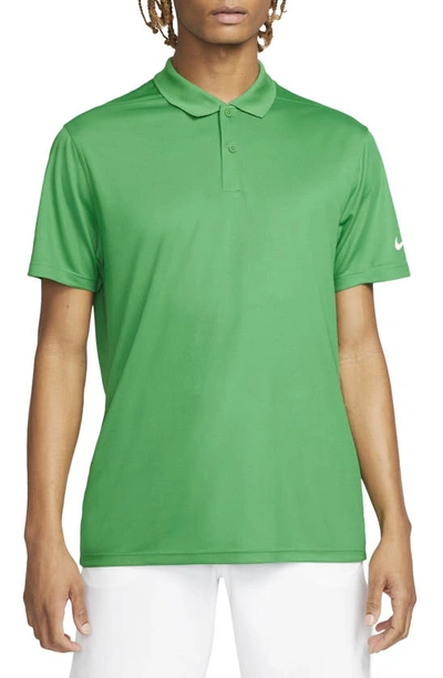Shop Nike Dri-fit Piqué Golf Polo In Classic Green/ White