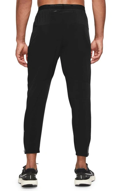 Shop Nike Dri-fit Phenom Woven Running Pants In Black/ Reflective Silver
