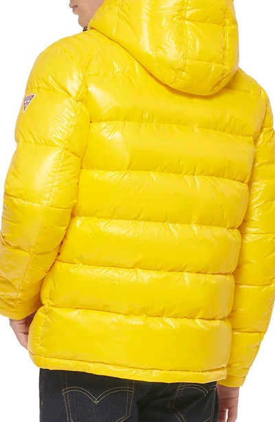 Shop Guess Hooded Solid Puffer Jacket In Sun
