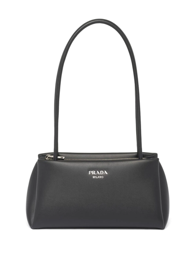 Shop Prada Small Logo-embossed Shoulder Bag In Black