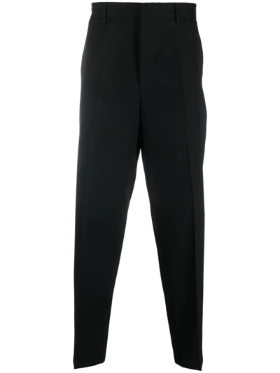Shop Jil Sander Virgin-wool Tapered Trousers In Black