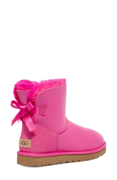 Shop Ugg Mini Bailey Bow Ii Genuine Shearling Bootie In Rock Rose