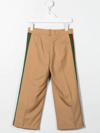 Shop Gucci Pleated Tailored-cut Trousers In Brown