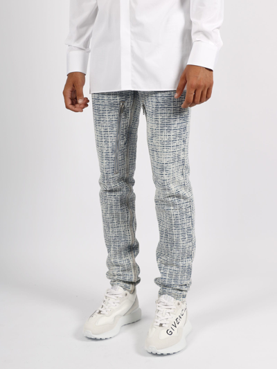 Shop Givenchy 4g Bleached Denim Jeans In Blue