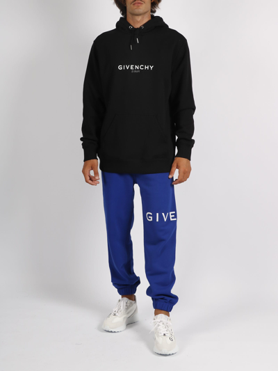 Shop Givenchy Reverse Hoodie In Black