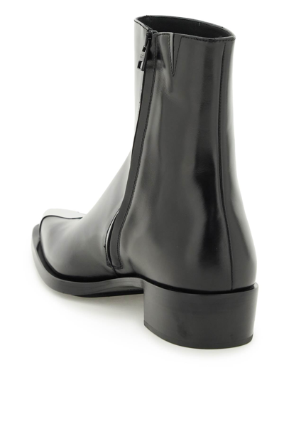 Shop Alexander Mcqueen Leather Ankle Boots With Metal Tip In Black