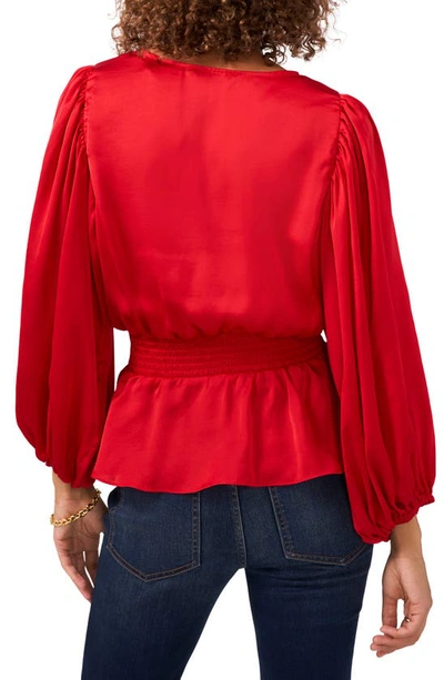 Shop Vince Camuto Smocked Peplum Blouse In Vermillion