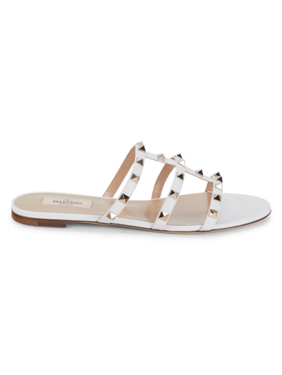 Shop Valentino Women's Rockstud Leather Flat Sandals In White