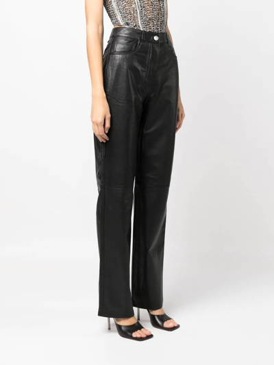 Shop Remain Charlene Wide-leg Leather Trousers In Schwarz