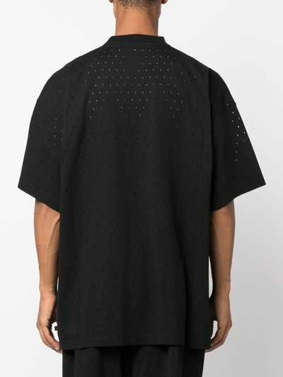 Shop Balenciaga Perforated Oversize T-shirt In Schwarz
