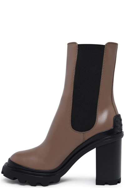 Shop Tod's Chunky Sole Heeled Ankle Boots In Tortora