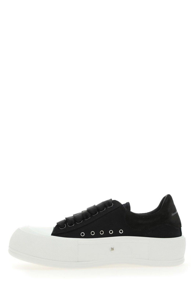 Shop Alexander Mcqueen Lace-up Round-toe Trainers In Nero