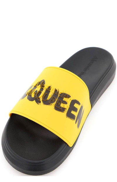 Shop Alexander Mcqueen Graffiti Logo Open Toe Slides In Giallo